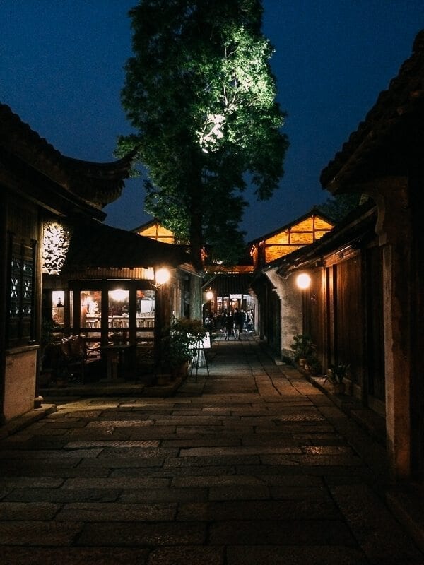 After the sun set, the whole water town lit up. The light brightened outdoor decks, shimmered on the water, and set a warm glow on the shops and restaurants. Going from the hustle and buzz of Shanghai to Wuzhen’s quiet canals and alleyways was a welcome change. Needless to say, it was a great stop on our tour of Shanghai!