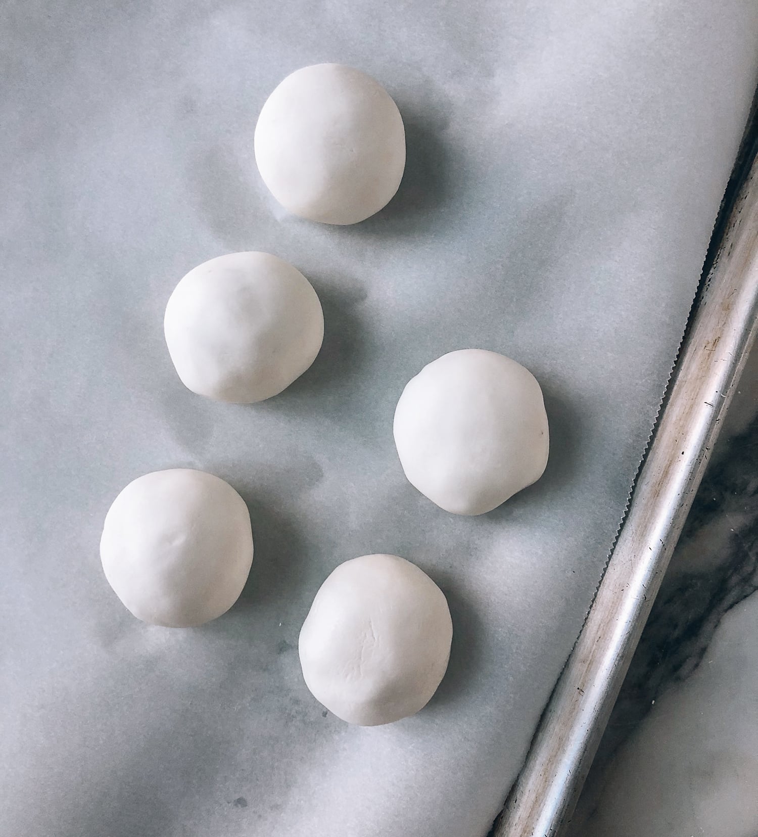 uncooked Savory Tang Yuan sitting on parchment paper, by bmeteor.aiodimecu.cf
