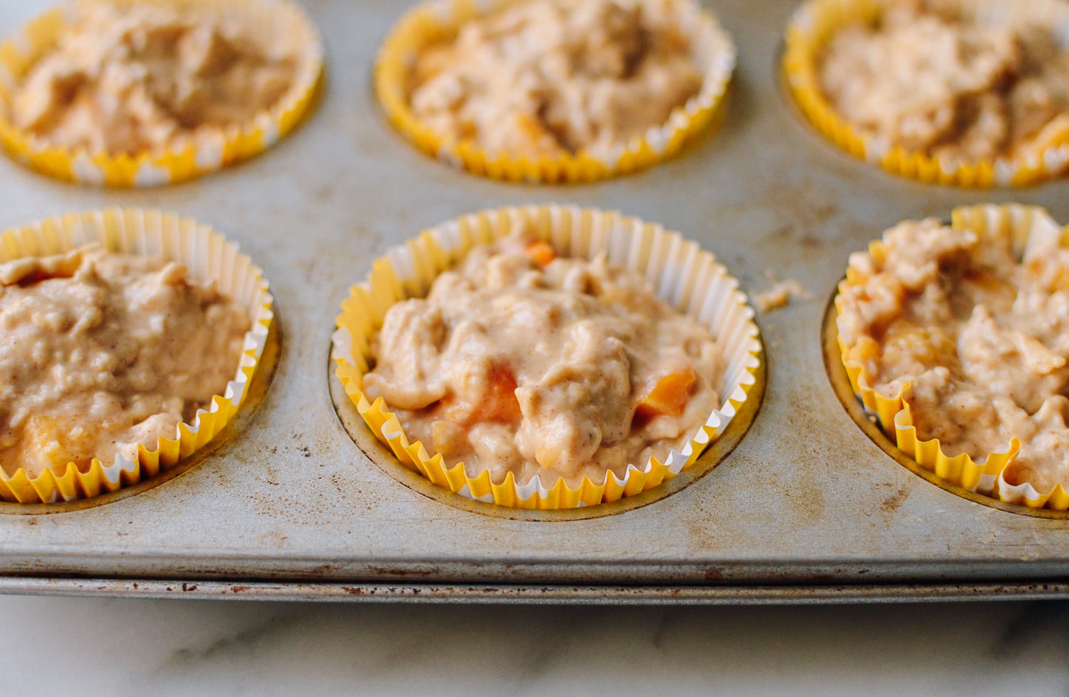 Filling muffin cups with batter, bmeteor.aiodimecu.cf