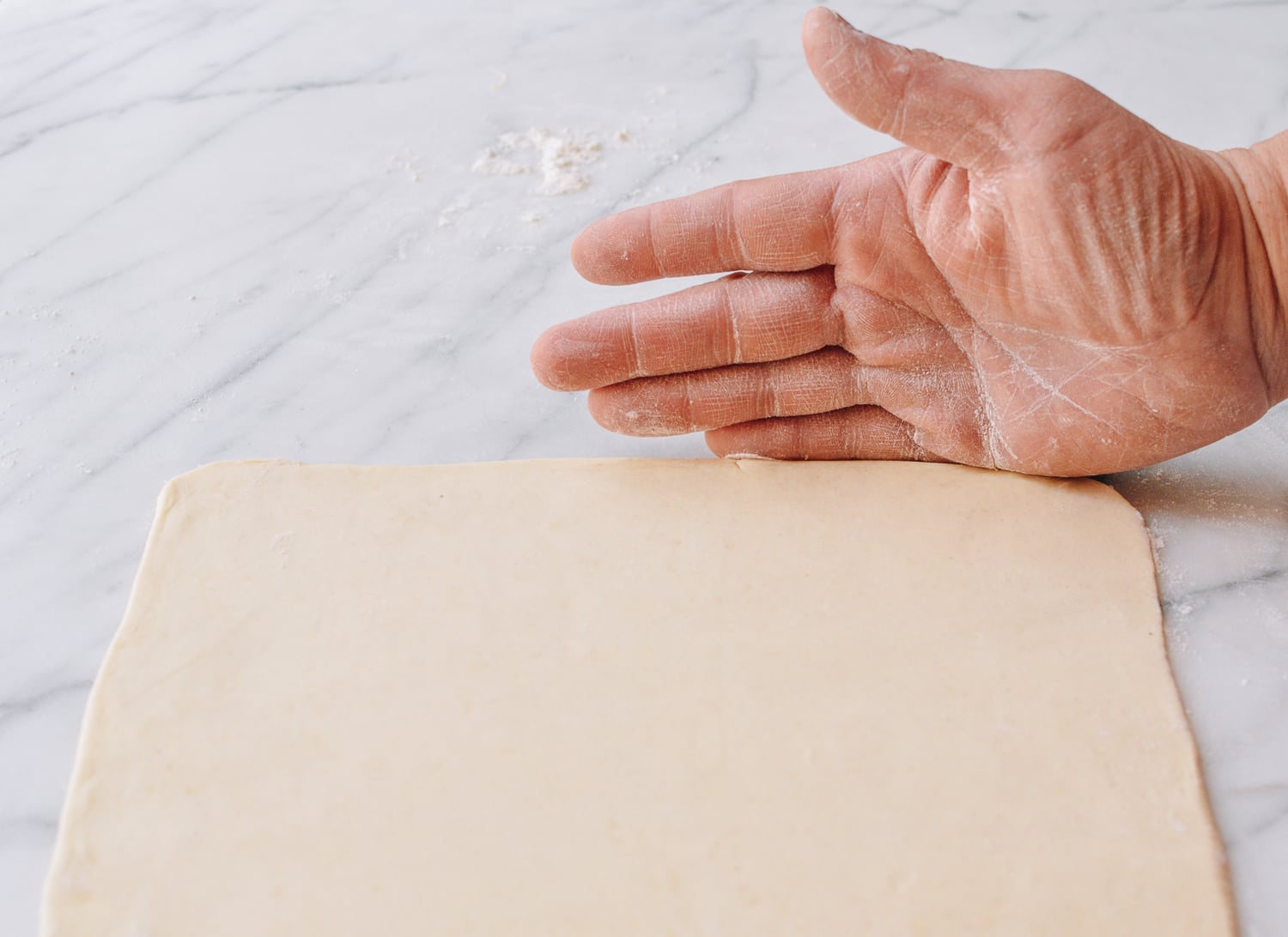 Using hands to straighten pastry edges, bmeteor.aiodimecu.cf