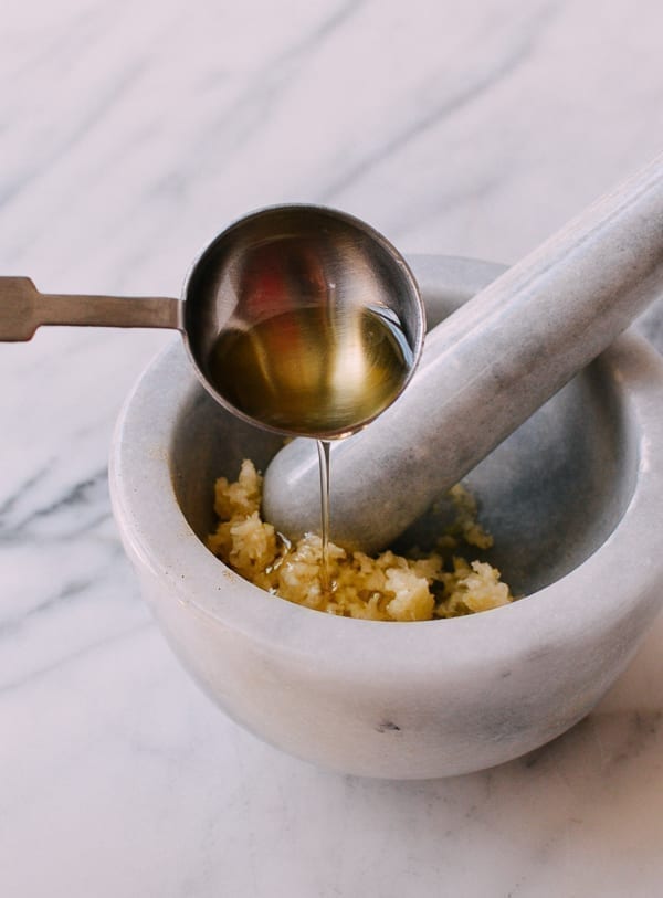 Mixing crushed garlic with olive oil, bmeteor.aiodimecu.cf