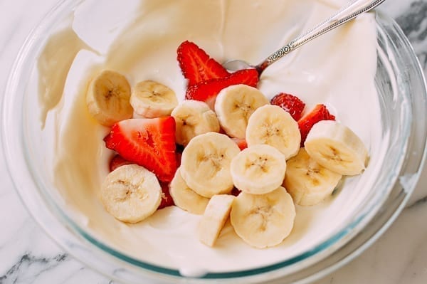 Folding sliced strawberries and bananas into yogurt mixture, bmeteor.aiodimecu.cf