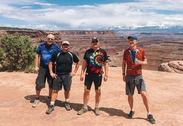 Mountain bikers group photo at top of Schafer trail on White Rim trail Moab Utah by bmeteor.aiodimecu.cf