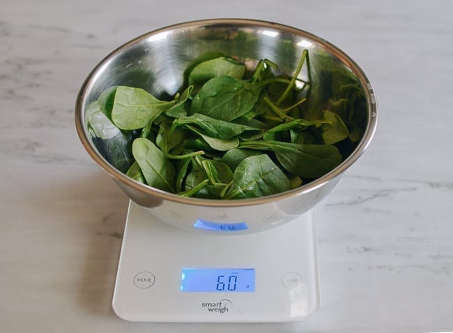 weighing out baby spinach, bmeteor.aiodimecu.cf