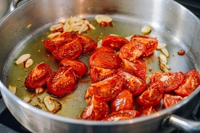 Adding tomatoes and tomato paste, bmeteor.aiodimecu.cf