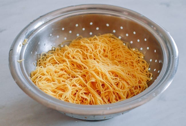 Draining noodles in colander, bmeteor.aiodimecu.cf