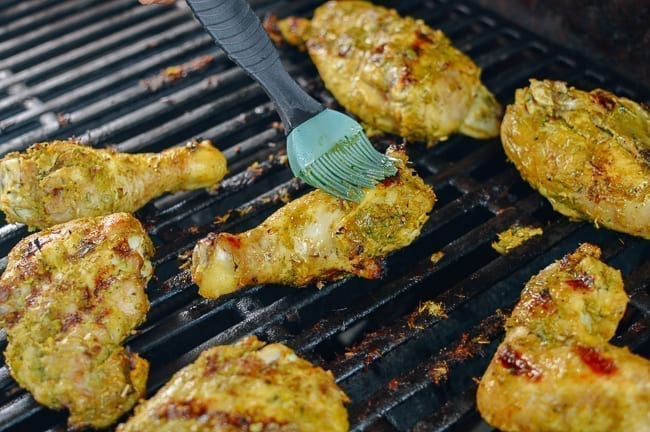 Basting gai yang chicken with marinade, bmeteor.aiodimecu.cf