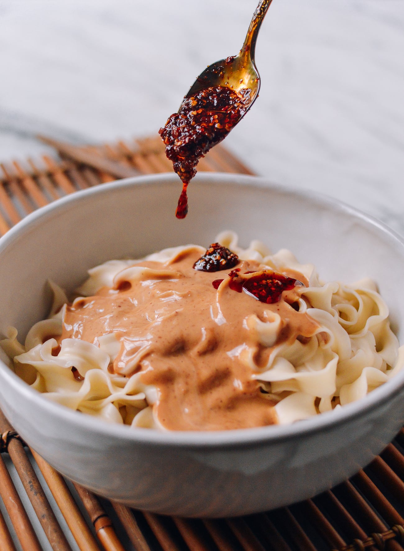 Adding extra chili oil to peanut noodles, bmeteor.aiodimecu.cf