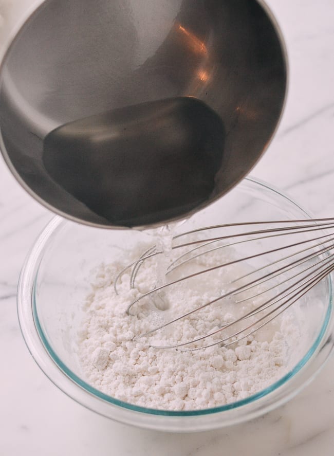 Adding hot sugar water to rice flour water mixture, bmeteor.aiodimecu.cf