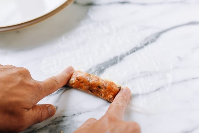 Pressing rice paper around filling, bmeteor.aiodimecu.cf