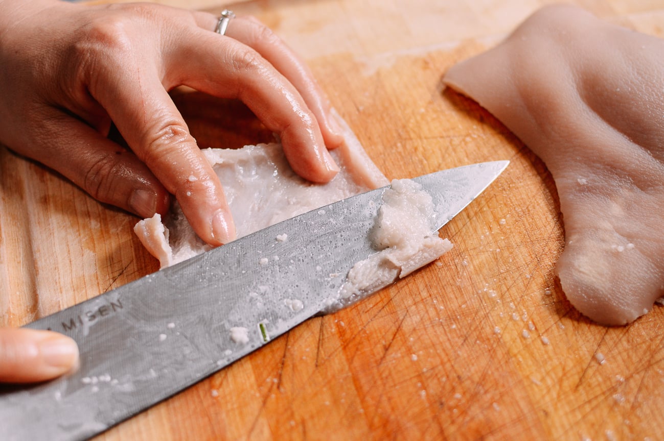 Scraping fat off of blanched pork skin, bmeteor.aiodimecu.cf