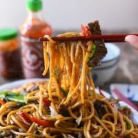 Picking up beef lo mein with chopsticks, bmeteor.aiodimecu.cf