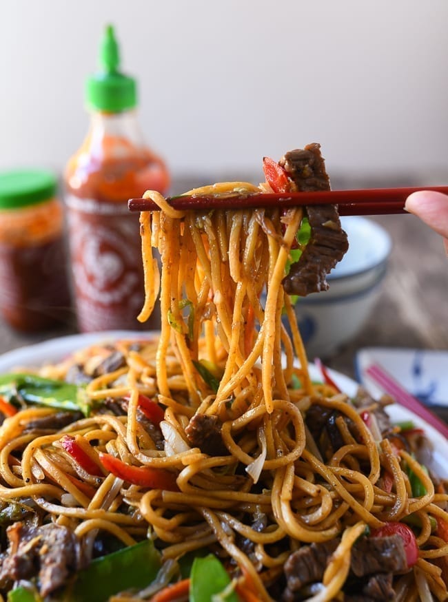 Picking up beef lo mein with chopsticks, bmeteor.aiodimecu.cf