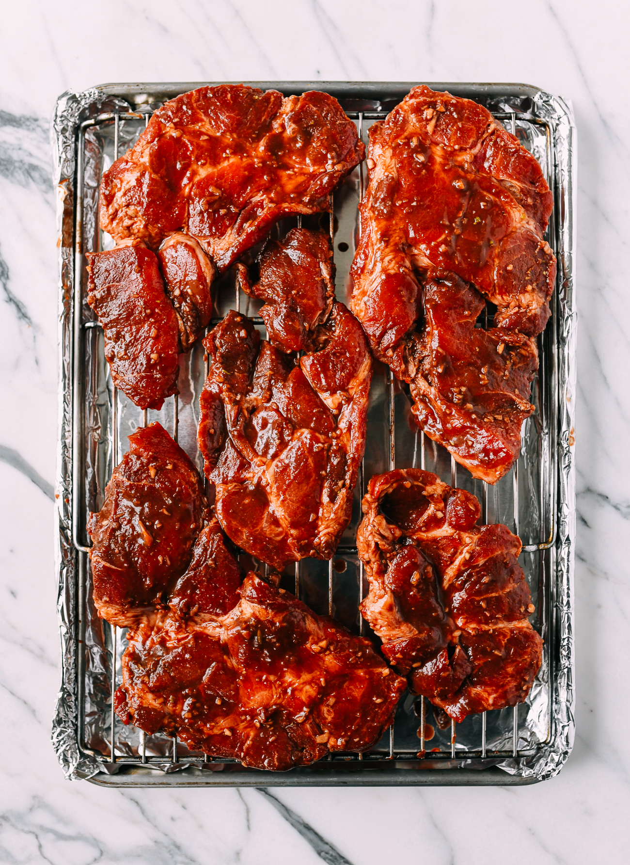 Pork pieces on roasting pan