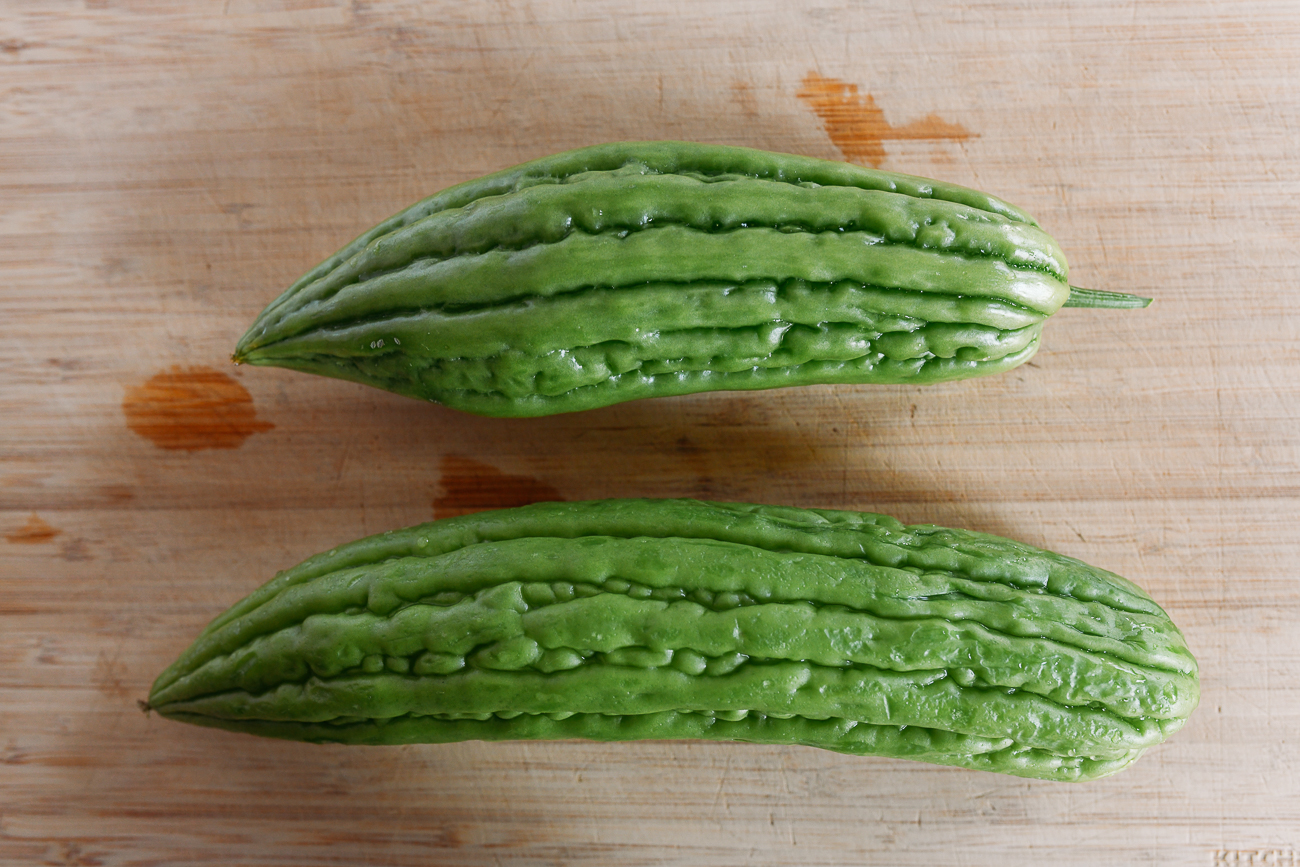Bitter melons on cutting board