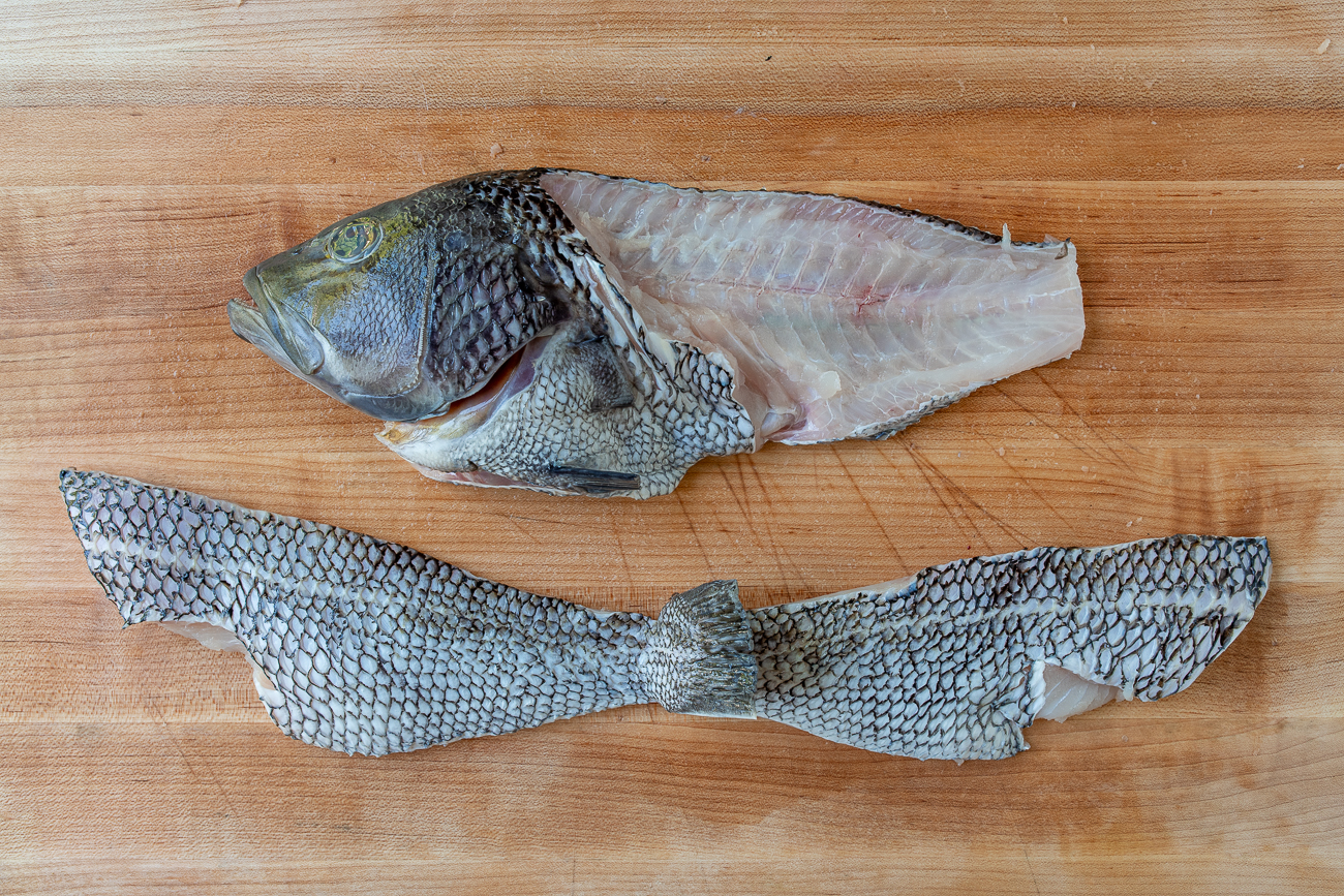 Two fish fillets attached at the tail