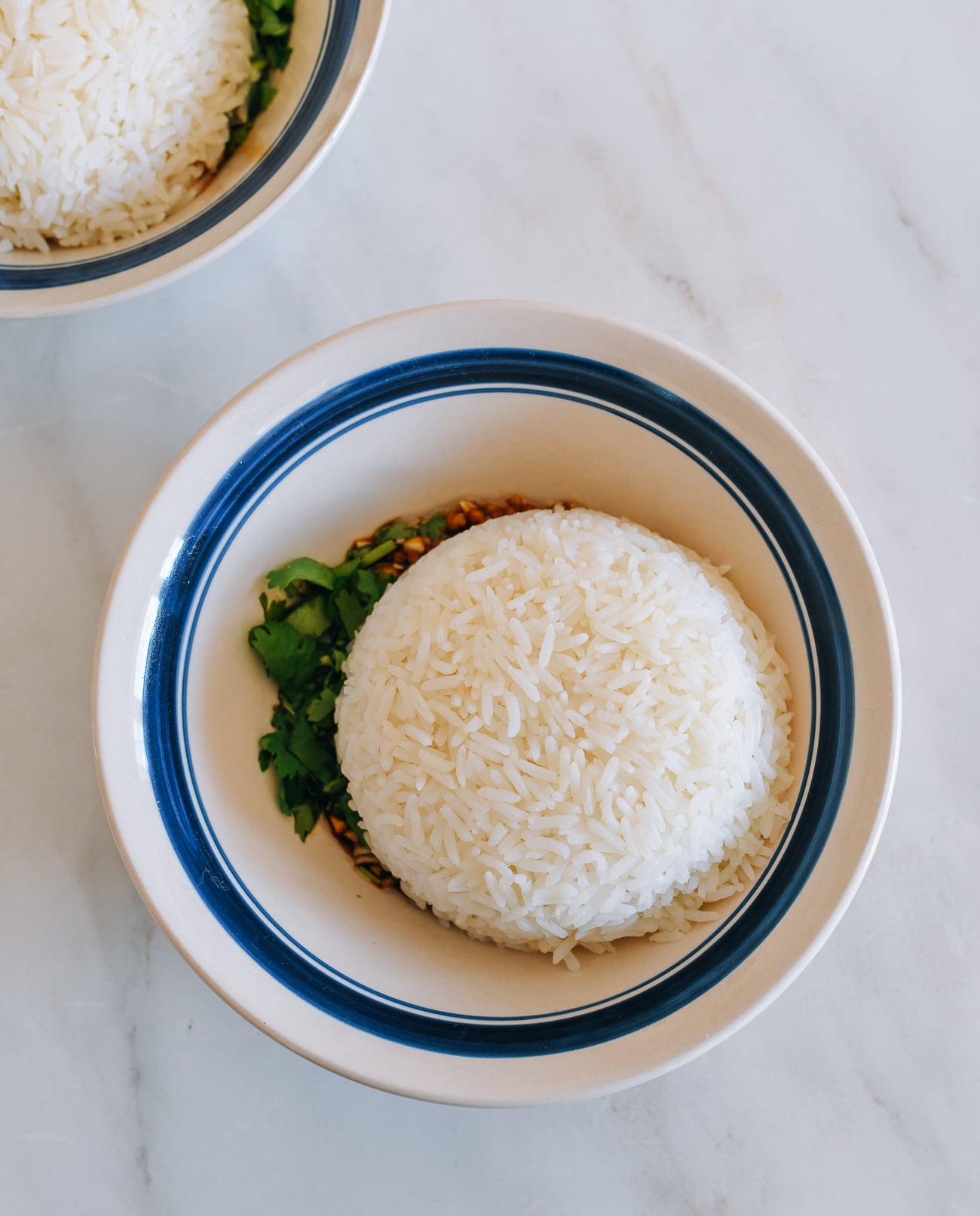 Adding rice to bowl