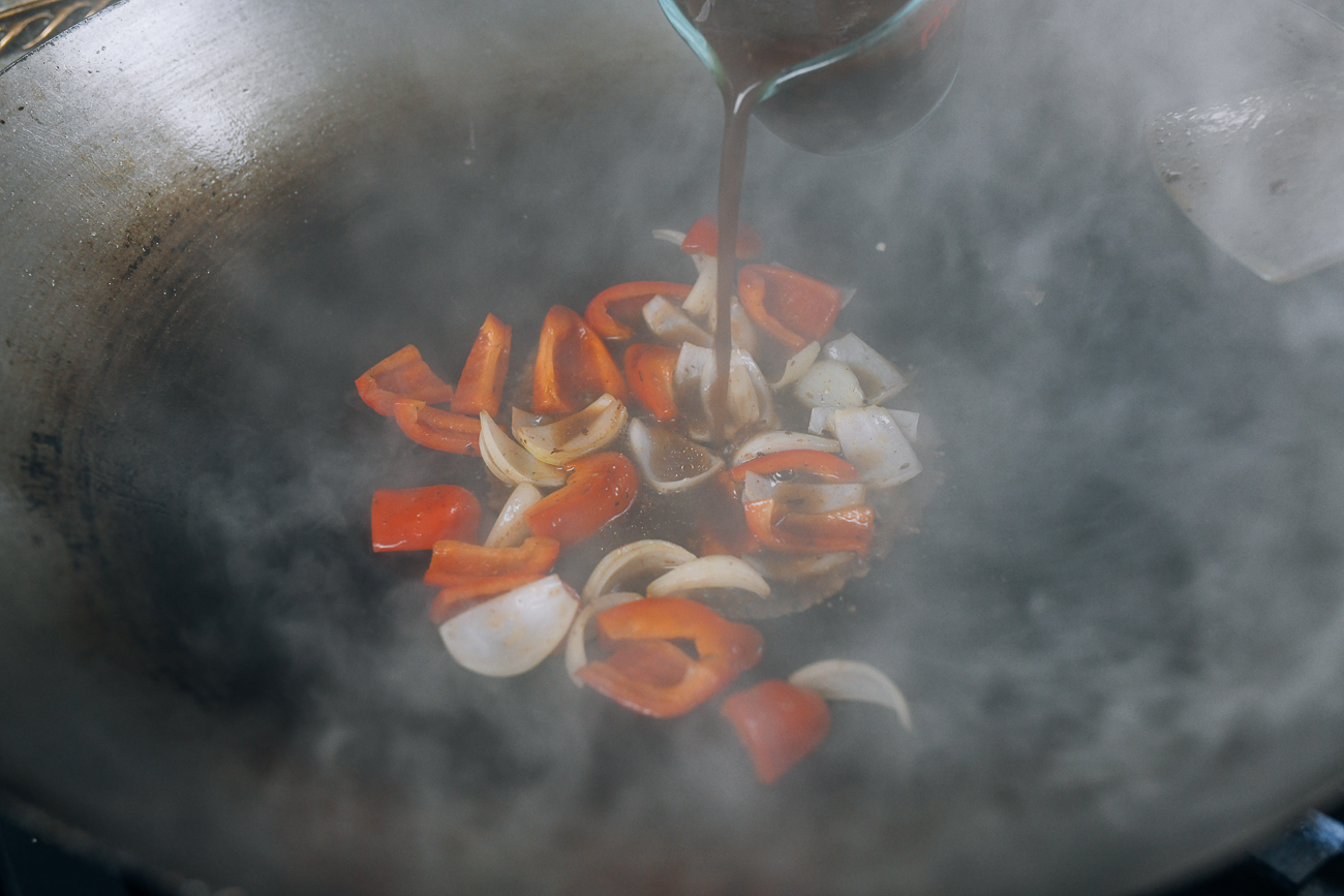 Adding sauce mixture bac