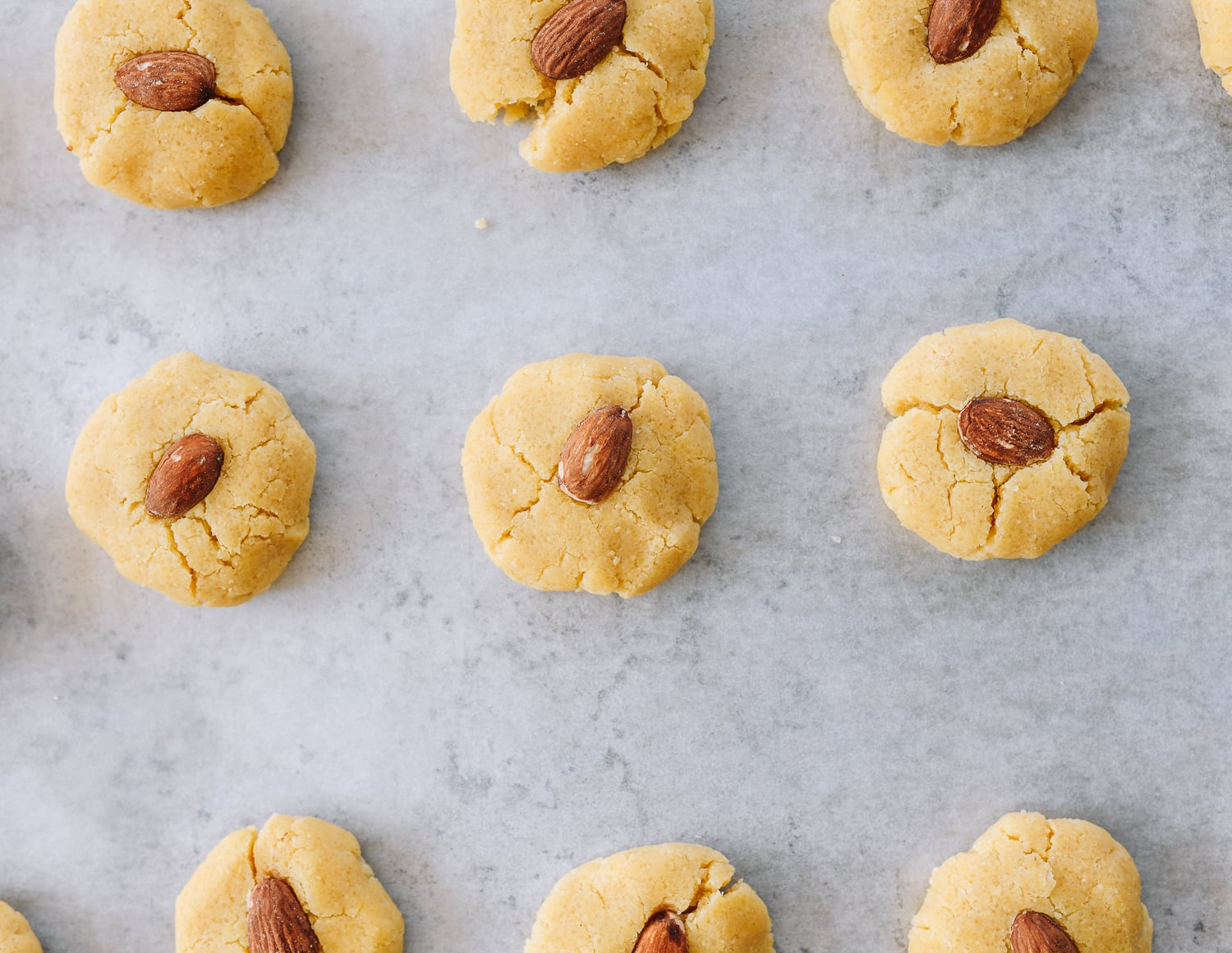 almonds pressed into cookie dough