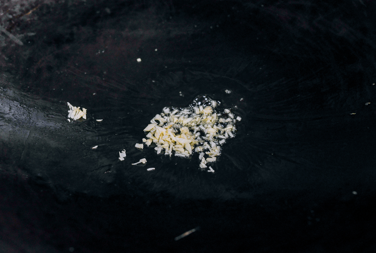 chopped garlic in wok